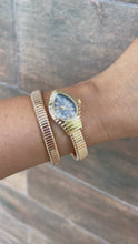 Cargar y reproducir el video en el visor de la galería, Reloj dorado esfera negra

