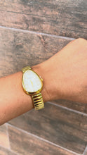 Cargar y reproducir el video en el visor de la galería, Reloj ovalado
